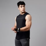 https://img2.hkrtcdn.com/33104/prd_3310391-MuscleBlaze-Delt-Tank-Midnight-Black-Medium_o.jpg